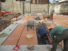Demolizione e ricostruzione di un edificio a destinazione mista - Piano Casa